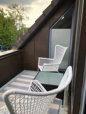 Ferienwohnung Gipfelstube 50 a mit Balkon, gute Verkehrsanbindung